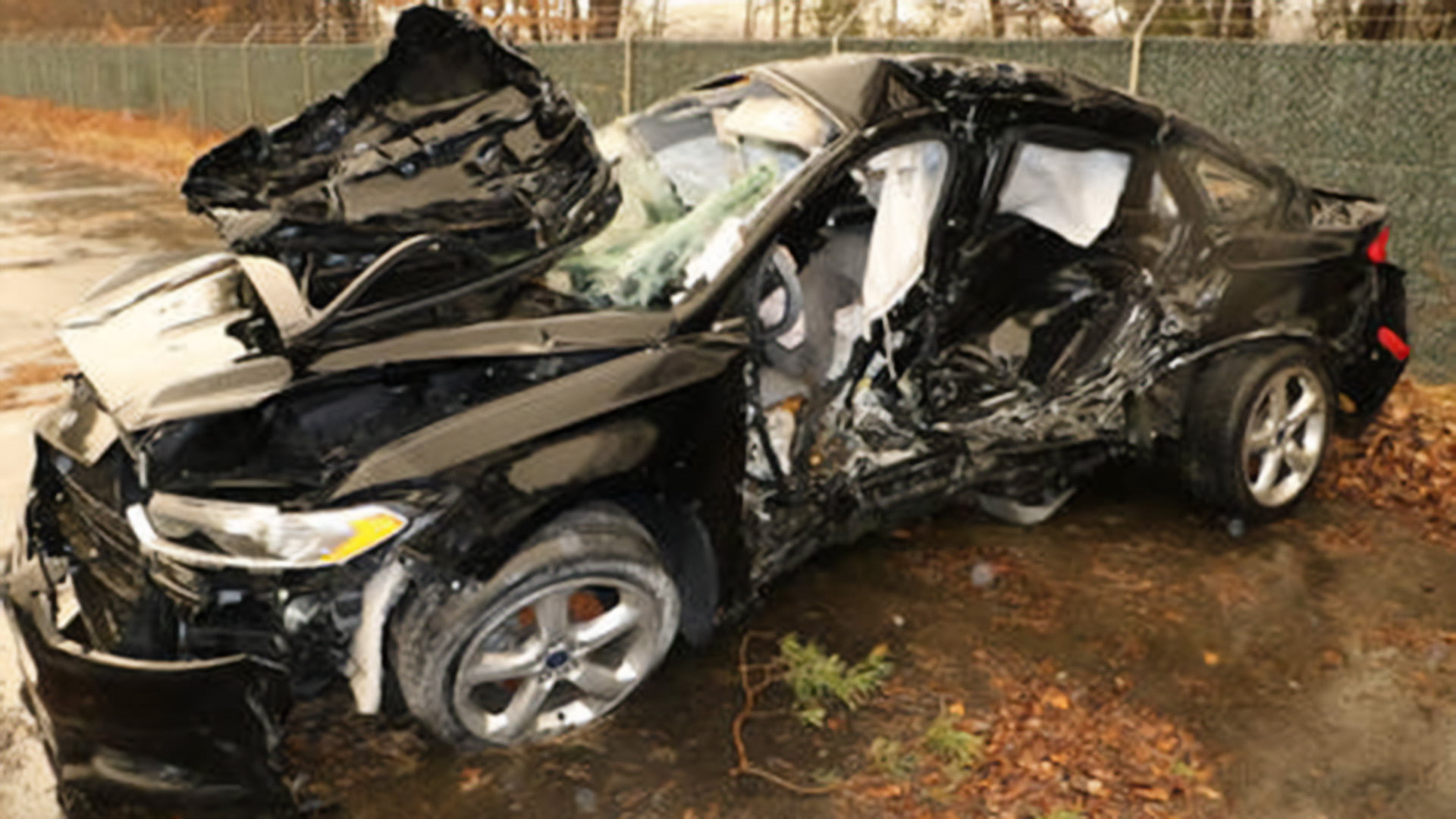 black sedan smashed after accident