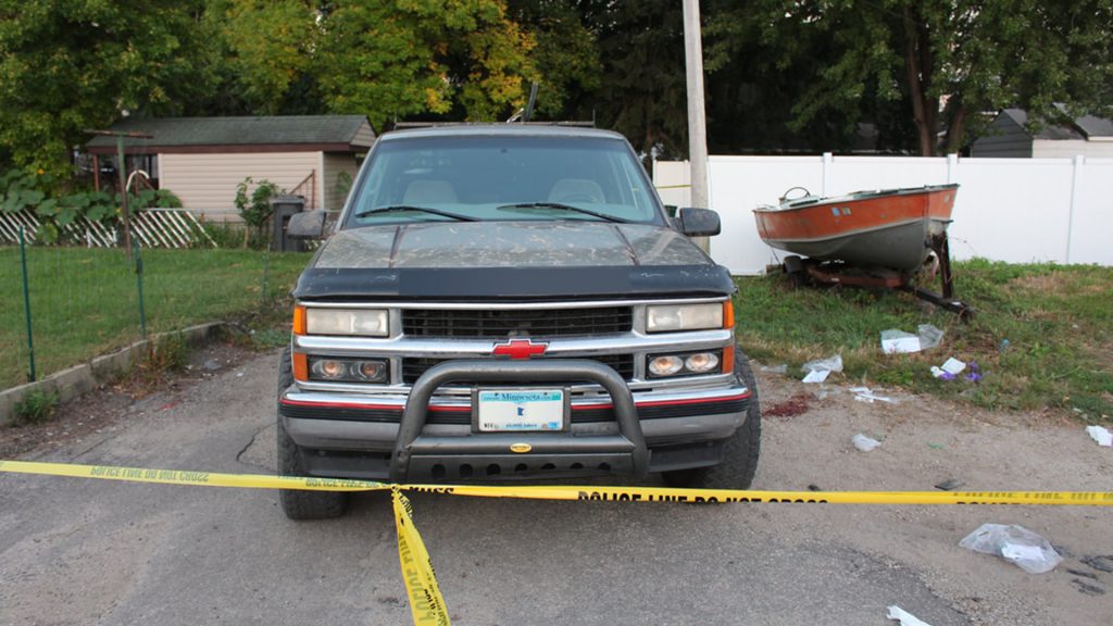 truck with caution tape after accident