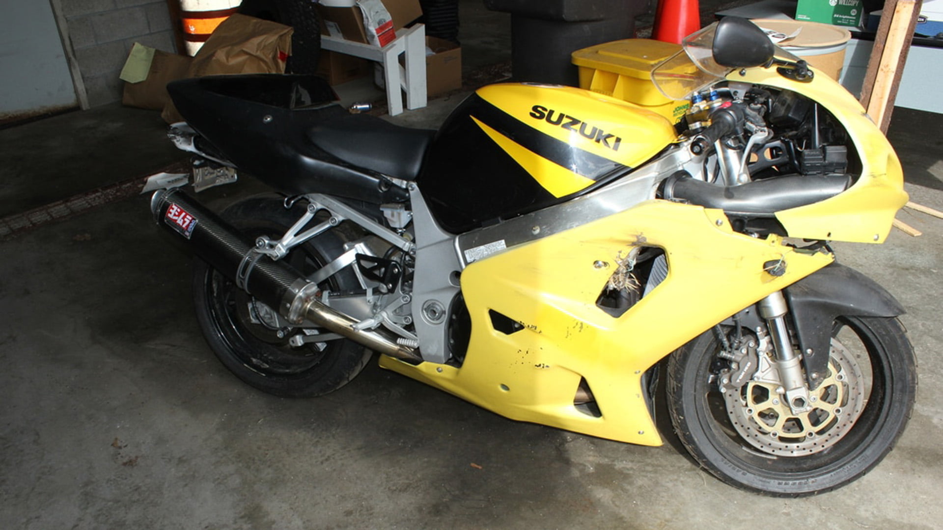 yellow suzuki motorcycle